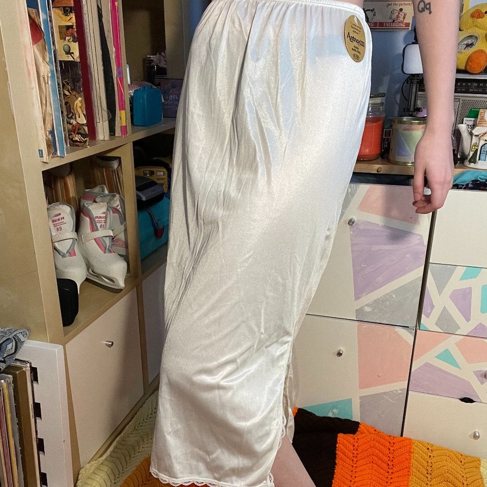 70s Tags Attached vintage silk nylon skirt slip with lace cut out!